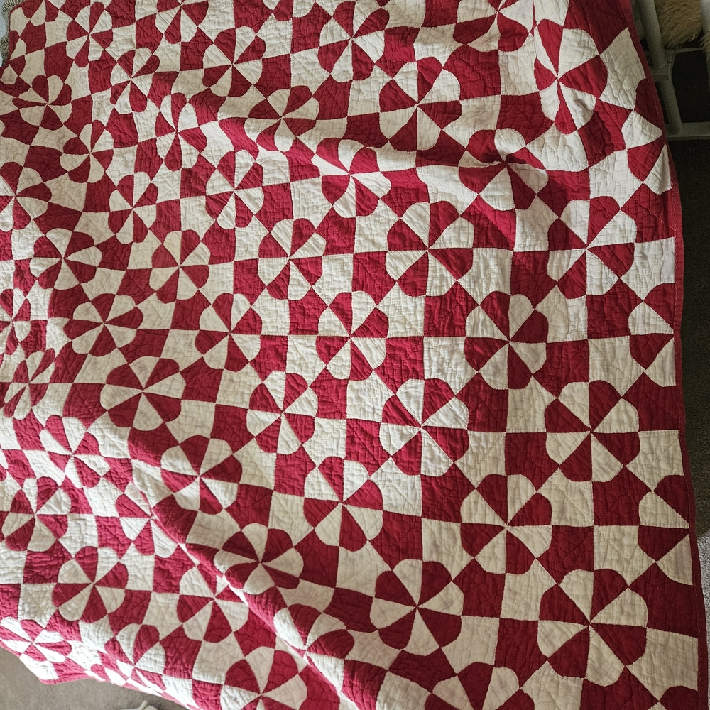 Red and White Patterned Quilt